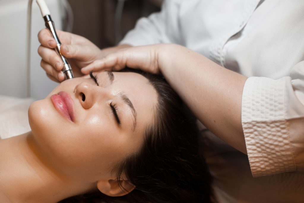 Portfolio 12 A Lady having microneedling on face | Get SkinPen Microneedling at Arabella Medical Aesthetics in Knoxville, TN