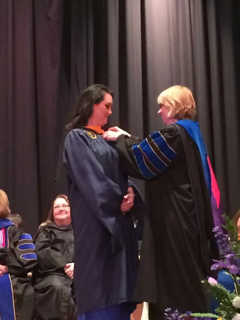 Erica receiving graduation from Nurse Practitioner School | Arabella Medical Aesthetics | Knoxville, TX